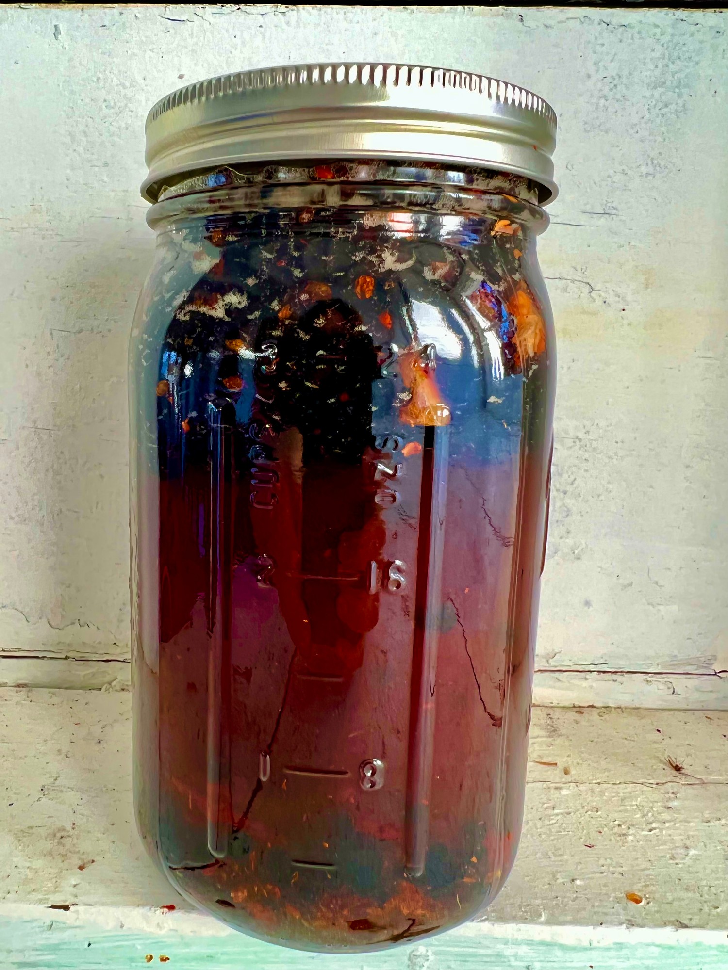 Elderberries, Rosehips, Ginger, and Cinnamon infusing in Raw Honey and Cognac