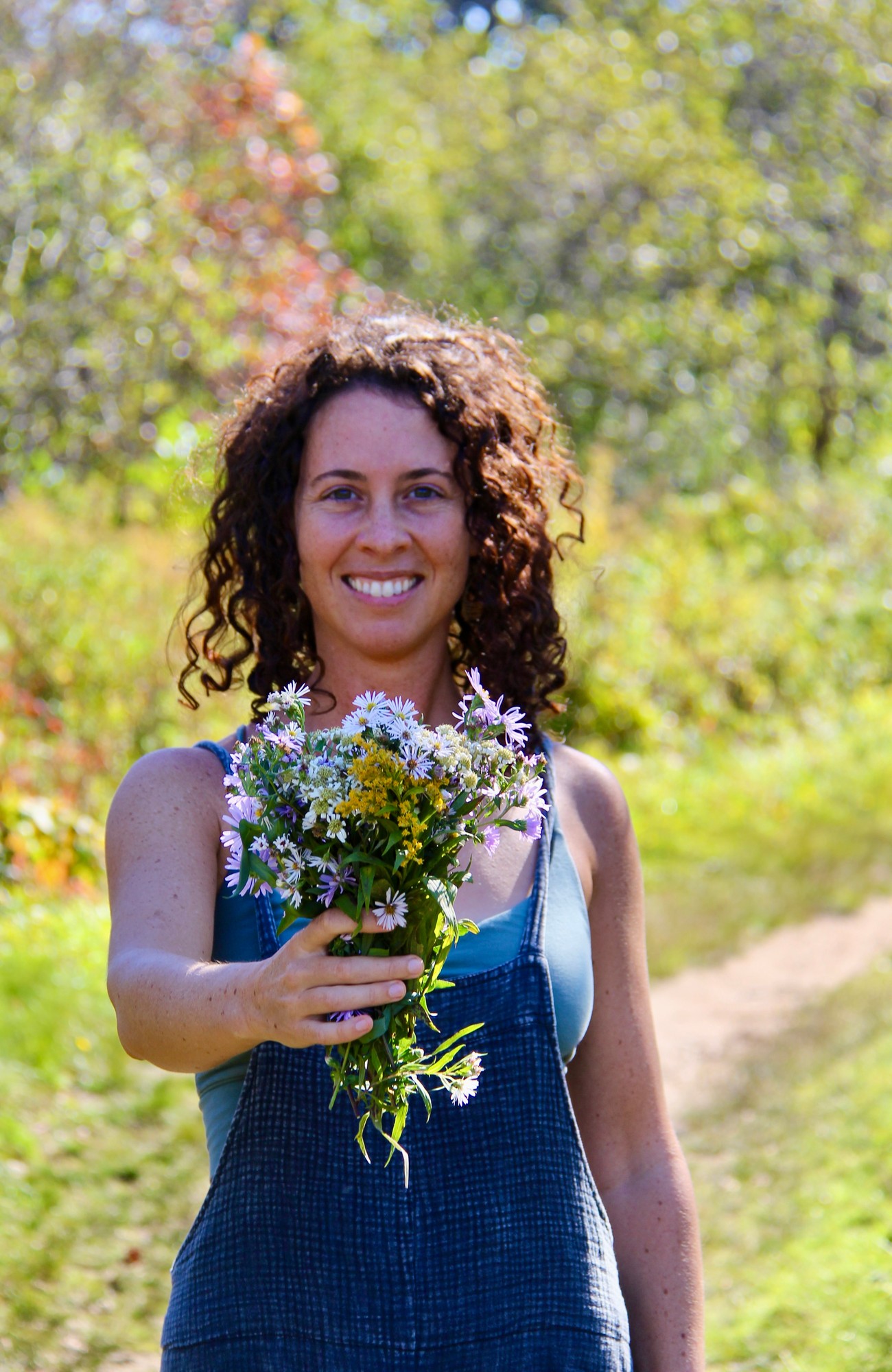 Vivian Rae Welcoming with Flowers